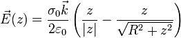 \vec{E}(z) = \frac{\sigma_0\vec{k}}{2\varepsilon_0}\left(\frac{z}{|z|}-\frac{z}{\sqrt{R^2+z^2}}\right)