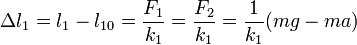 \Delta l_1 = l_1-l_{10} = \frac{F_1}{k_1}=\frac{F_2}{k_1}=\frac{1}{k_1}(mg-ma)