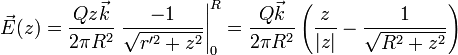 \vec{E}(z) = \frac{Qz\vec{k}}{2\pi R^2}\left.\frac{-1}{\sqrt{r'^2+z^2}}\right|_0^R=\frac{Q\vec{k}}{2\pi R^2}\left(\frac{z}{|z|}-\frac{1}{\sqrt{R^2+z^2}}\right)