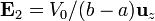 \mathbf{E}_2 = V_0/(b-a)\mathbf{u}_z
