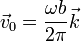\vec{v}_0 = \frac{\omega b}{2\pi}\vec{k}