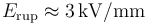 E_\mathrm{rup}\approx 3\,\mathrm{kV/mm}