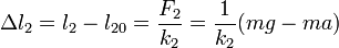 \Delta l_2 = l_2-l_{20} = \frac{F_2}{k_2}=\frac{1}{k_2}(mg-ma)